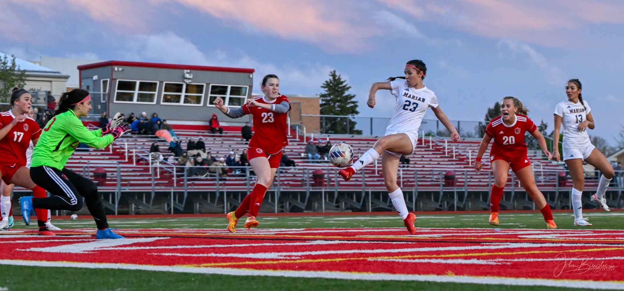 Sophomore forward Giu Giu Agrusso takes o shot against Divine Child on April 23 (PHOTO: J. Bingham)
